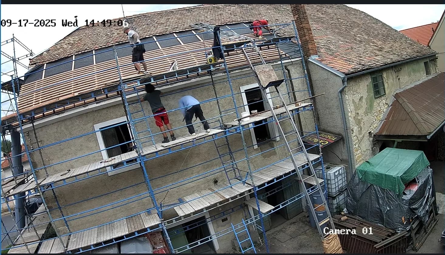 Pracovní záznam z opravy střechy. Fotografie majitelů pivovaru.